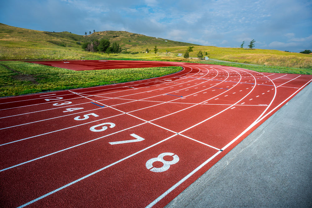 Outdoor Track starting line with C-Hill in the background