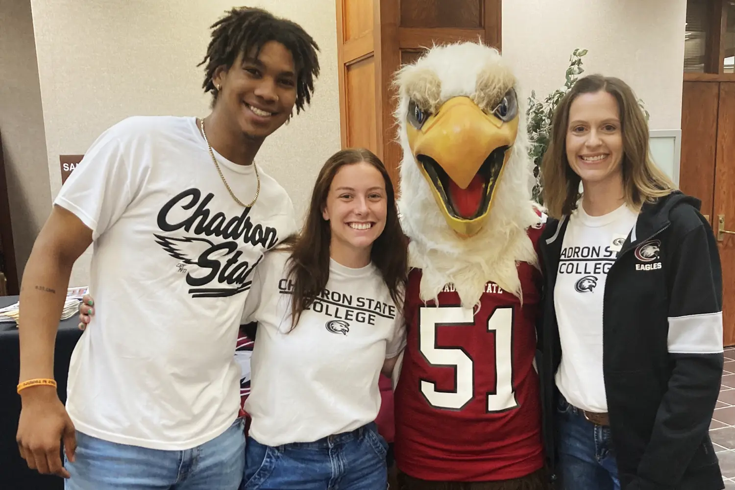 Admissions employees pose during an Orientation event