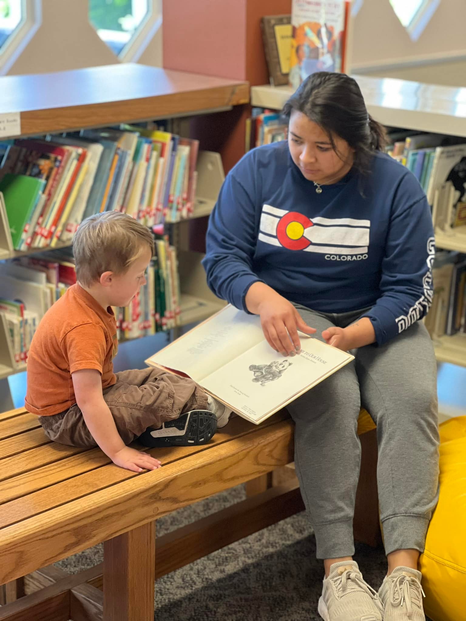 Teacher Reading to Child