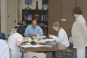 Students eat food prepared during a Family and Consumer Sciences class