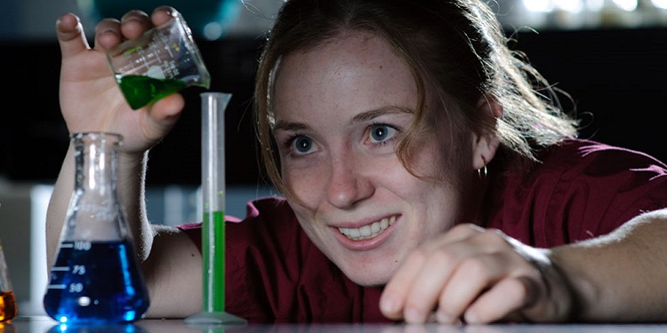 Woman doing an experiment 750x375