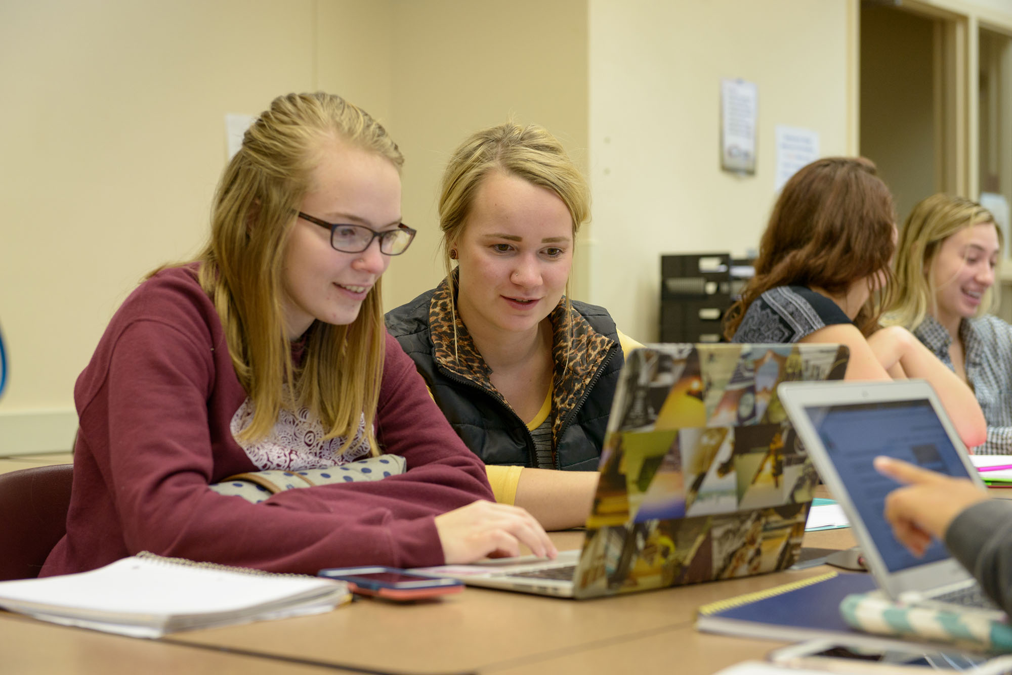 Social Work students work on a project