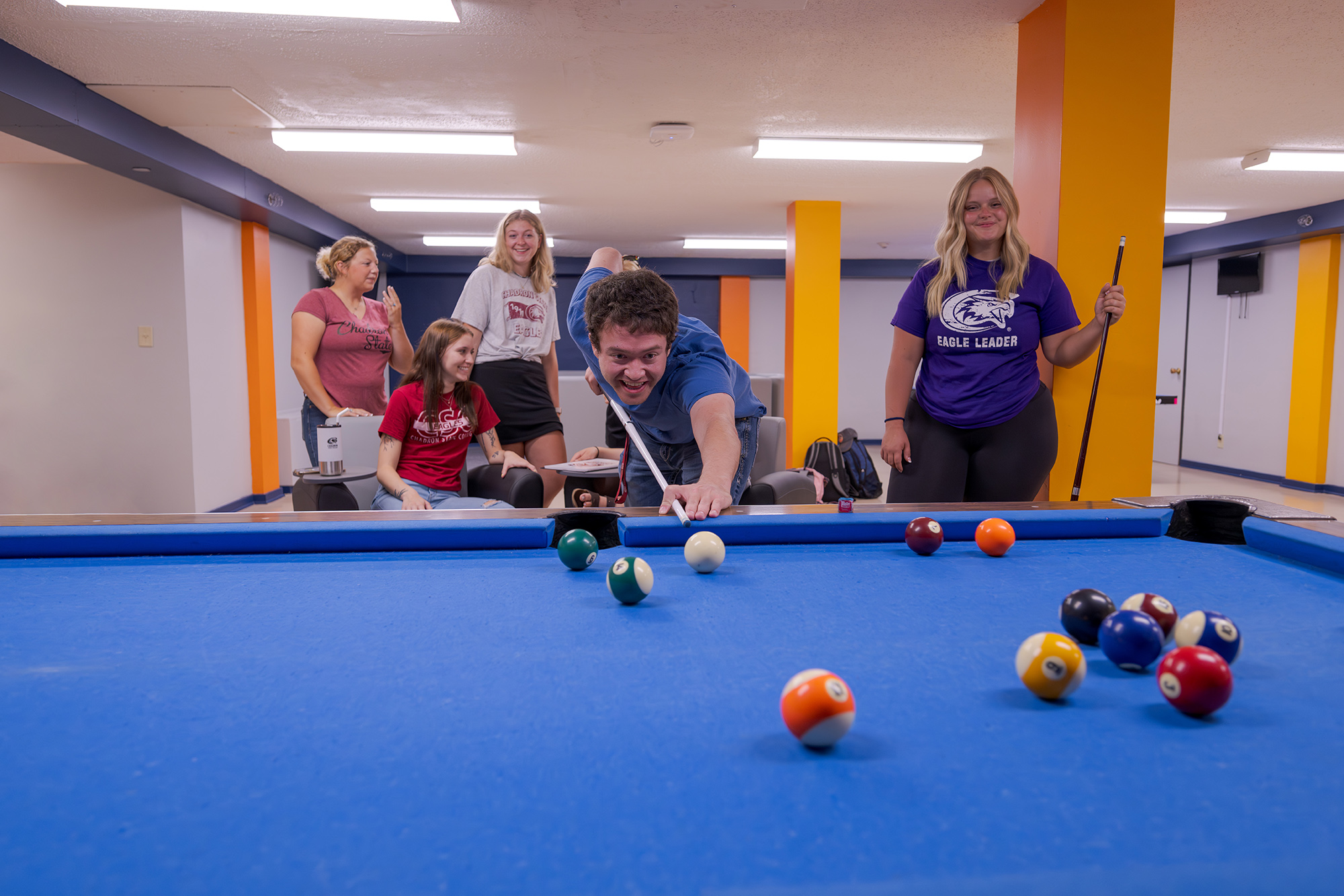Students playing pool