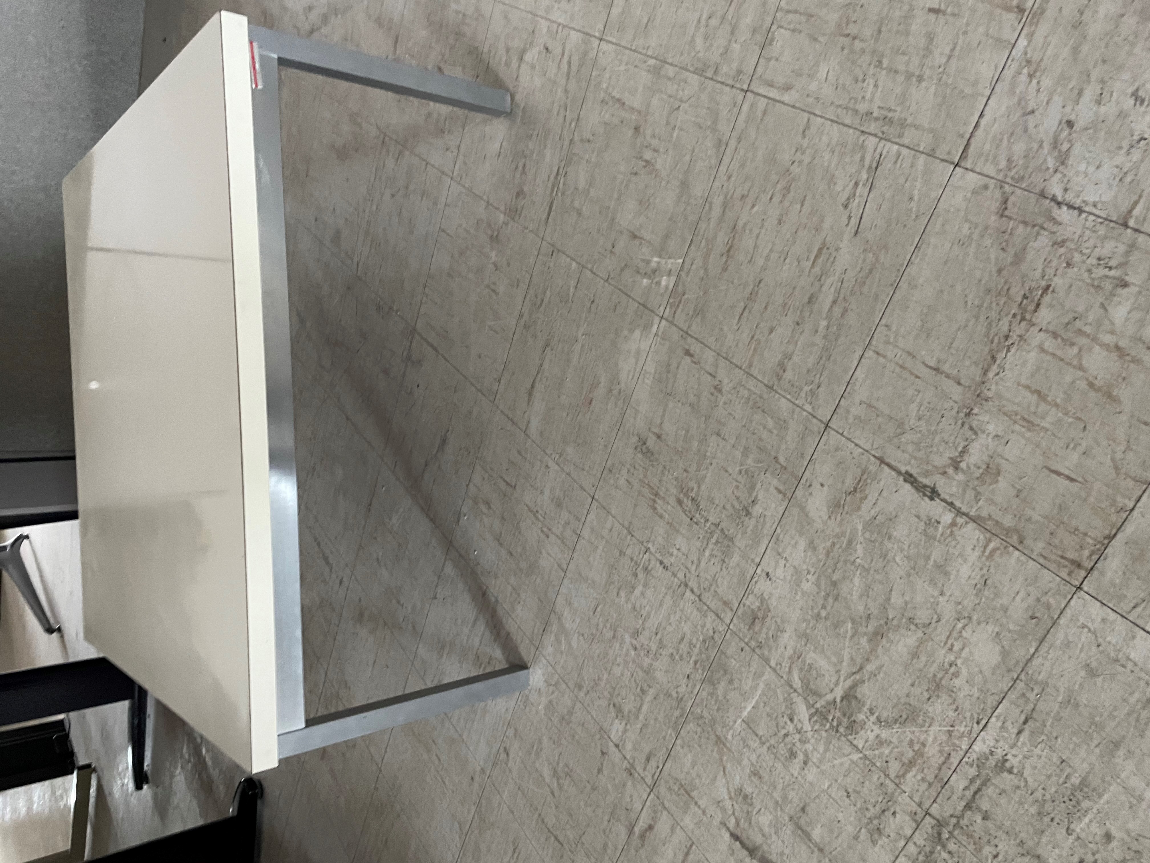 Small white table with metal legs