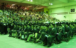 The crowd applauds graduates during the May 2003 ceremony.