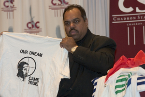 Daryl Davis holds up Martin Luther King t-shirt