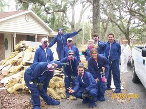Students pose while helping rebuild and cleanup after Hurricane Katrina