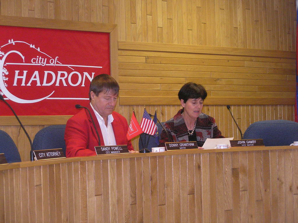 Laure Sinn, CSC coordinator of student activities, reads Mayor Donny Grantham's Scholastic Day proclamation.