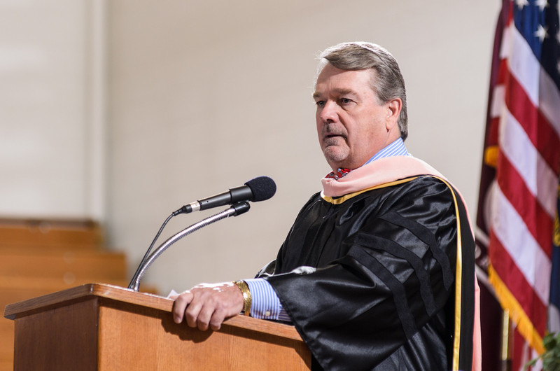 Stan Carpenter, chancellor of the Nebraska State College System, speaks during Chadron State College's undergraduate commencement ceremony. Carpenter, who has led the NSCS for 12 years, delivered the commencement address. (Photo by Daniel Binkard)