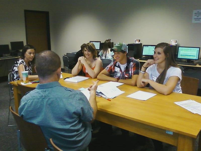 New Chadron State College students meet with members of the faculty during the June 6 registration session. The third and final registration event will be June 20. (Photo by Tena Cook)