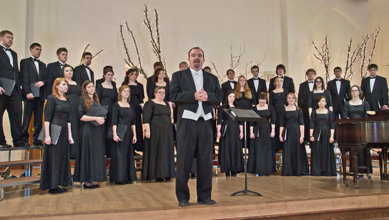 Chadron State College music professor and conductor Dr. Joel Schreuder, center, during a spring 2013 concert in the Chadron Arts Center. (Tena L. Cook/Chadron State College)