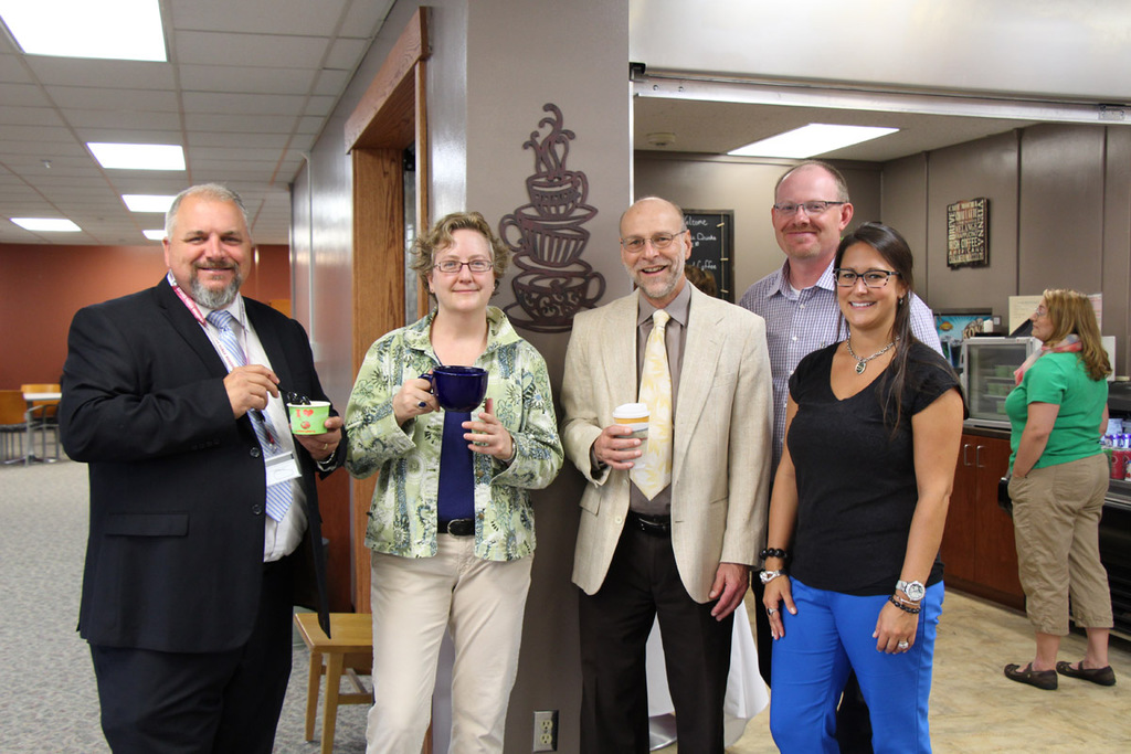 The coffee shop in the Library Learning Commons opened Wednesday. From left, Jon Hansen, vice president of enrollment and marketing, Susan Hines, associate vice president of teaching and learning technologies, Charles Snare, vice president of academic affairs, Tracy Shuck, resident operations director with CSC Dining Services and Taryn Marcy, catering manager with CSC Dining Services.