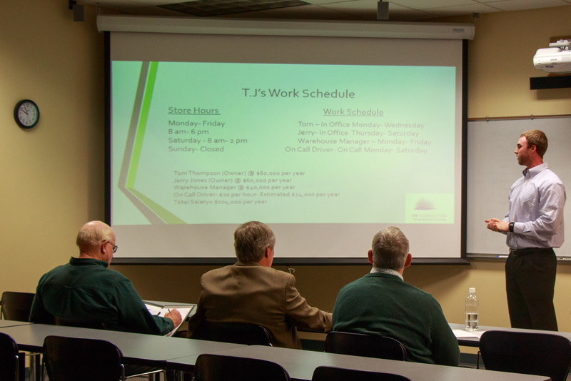 Zac Bargen presents a business financial plan to a panel.