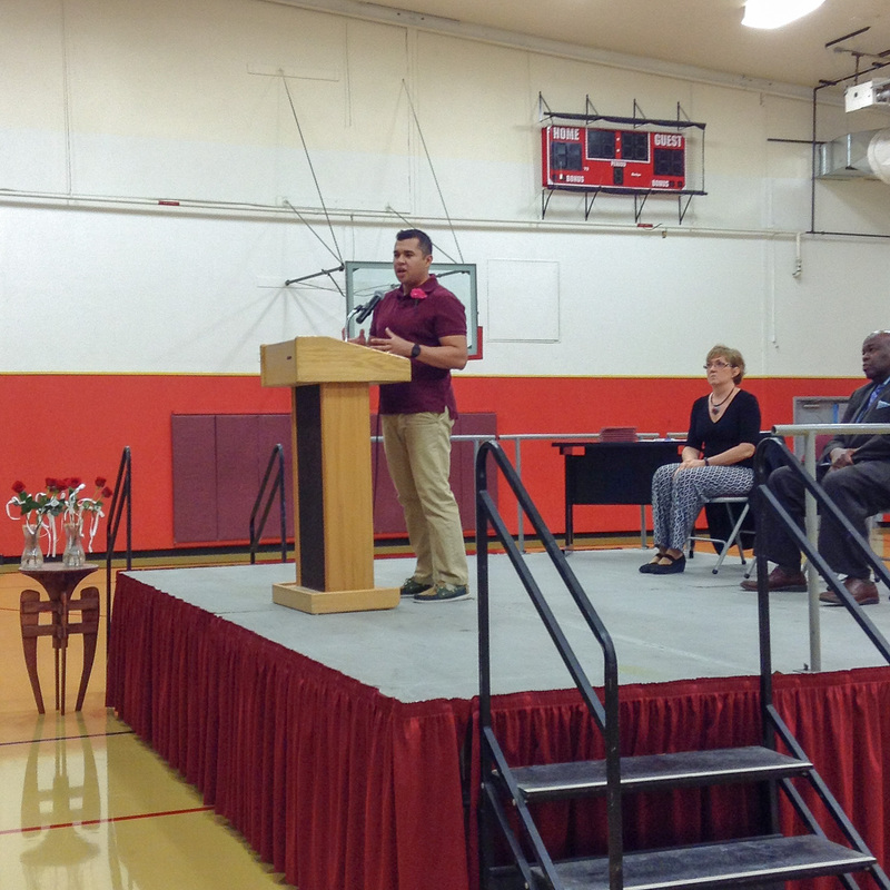 Chadron State College senior Cristian Yanes-Salazar speaks at the Pine Ridge Job Corps Civilian Conservation Center graduation April 17.