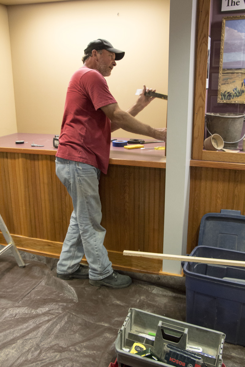Kent Wickham begins work on one of two exhibits in the Mari Sandoz High Plains Heritage Center under renovation this summer.