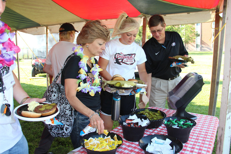 Becky, Sadie and Ron Bolze during the 2013 New Student Orientation barbeque.