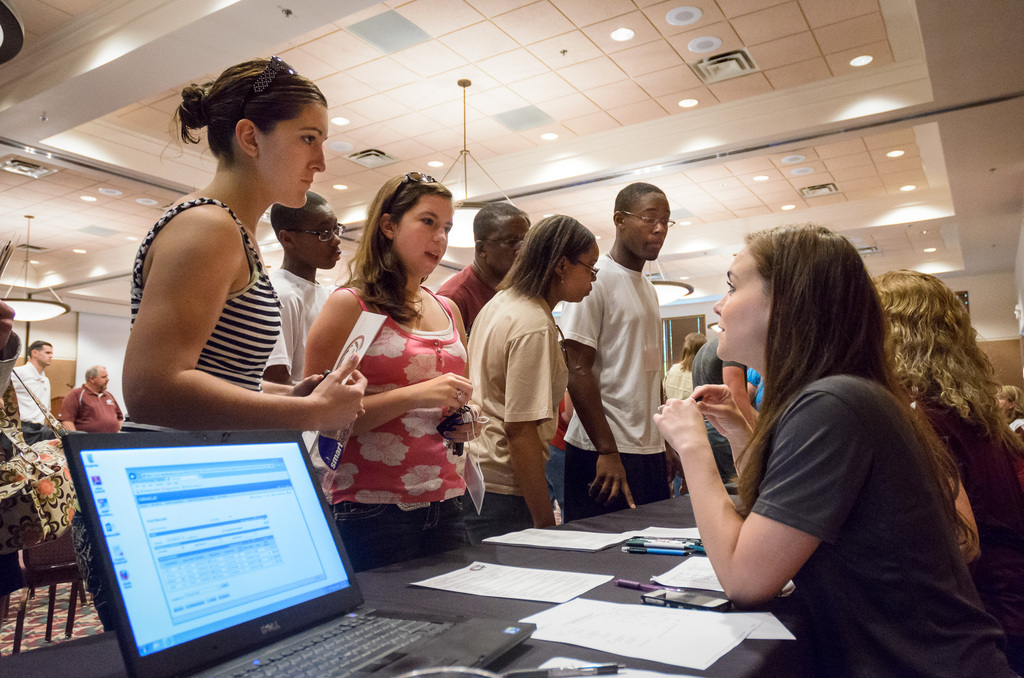 Cassie Ritzen greets prospective students at a Chadron State College on-campus registration session.