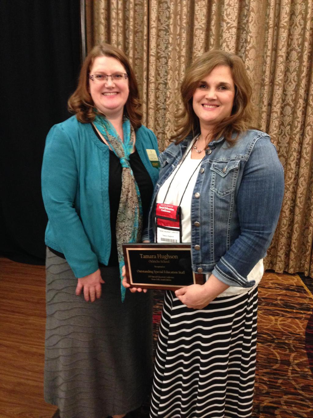 Tami Hughson, right, recently accepted the Special Education Teacher of the Year award for the state of South Dakota.