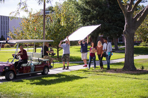 Dewayne Gimeson drives a golf cart