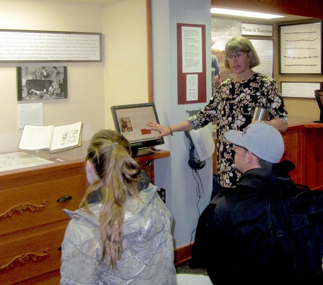 Historian Tammi Littrel tells students in Ron Bolze's beef production class about the ranch women featured in an exhibit in the C.F. Coffee Gallery at the Mari Sandoz High Plains Heritage Center at Chadron State College