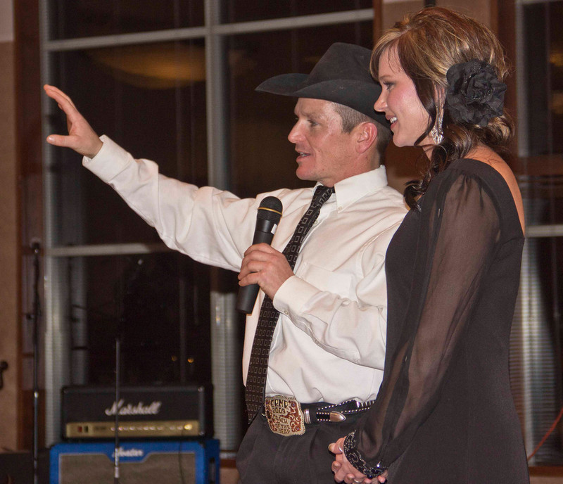 Chadron State College rodeo team coach Dustin Luper and team member Amy Tierney of Oral, S.D., at the 2014 Black Tie Calf Fry Saturday night on campus.