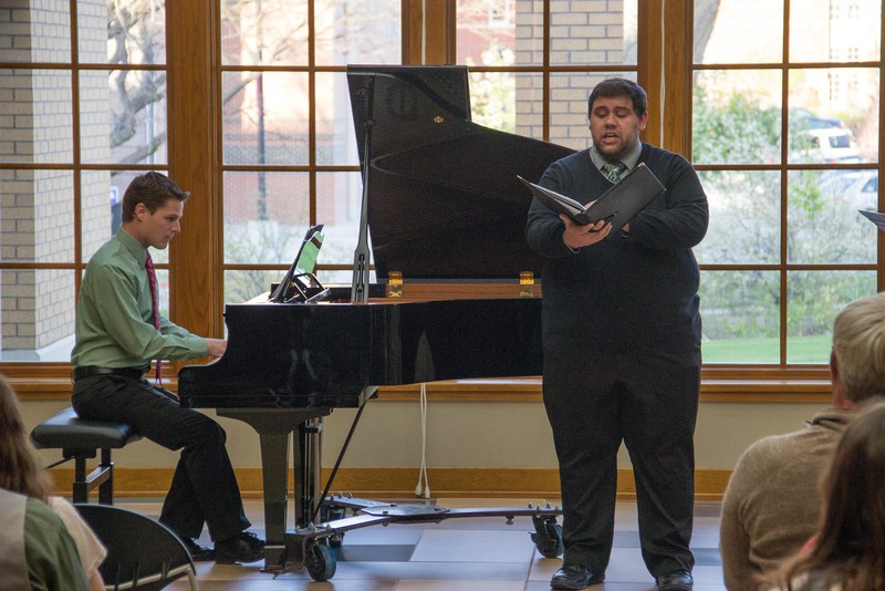 Bobby Pace, left, and Zach Henderson perform during a Chadron State College student and faculty composers concert Wednesday, April 26, 2017, in the Sandoz Center Chicoine Atrium