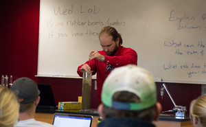 Anthony Perlinski , assistant professor of Applied Sciences, instructs students in soil saturation in the new lab in the Rangeland Lab, Oct. 24, 2016.