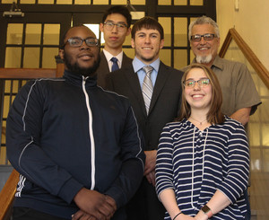 students accepted to law schools pose for photo
