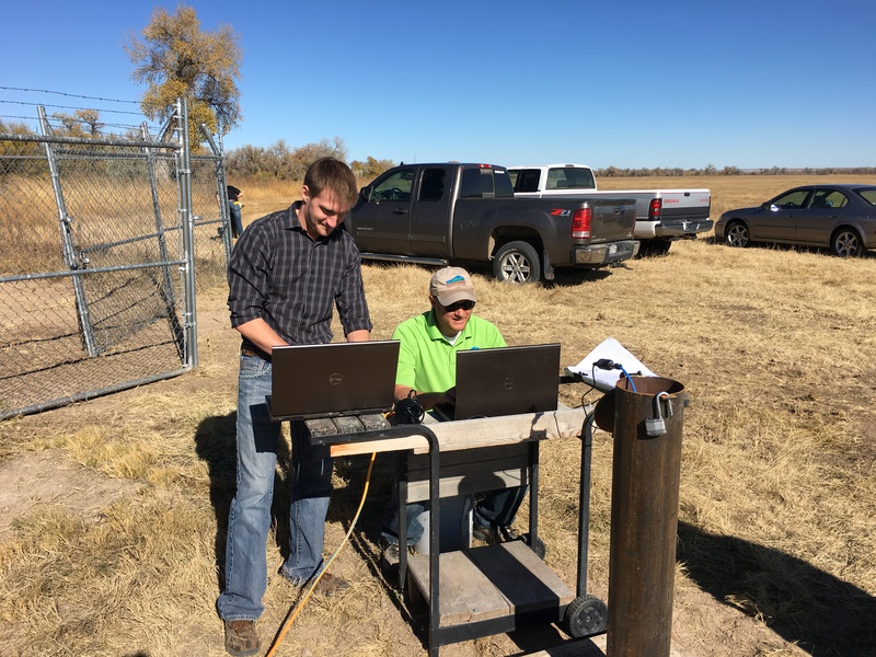 Joe Reedy, left, collects field data in November 2015 for a groundwater model in Colorado with his co-worker Kyle Liebig