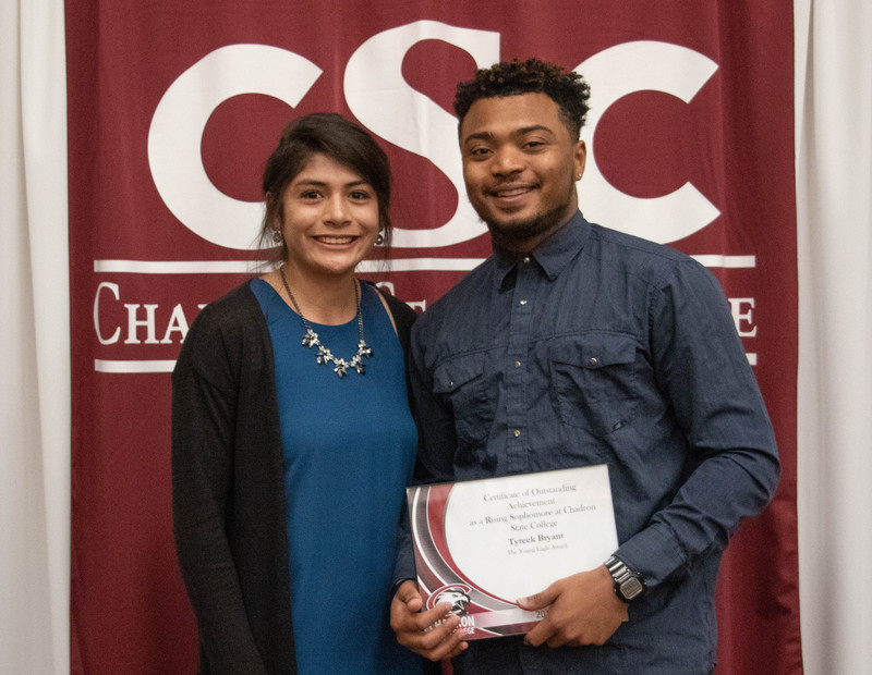 The 2018-19 Young Eagle Tyreek Bryant of Denver, Colo., right, poses with the 2017-18 Young Eagle Celeste Cardona