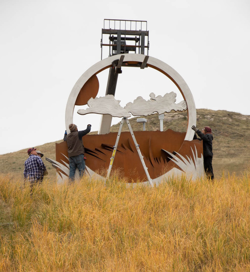 Crews position the top half of the
