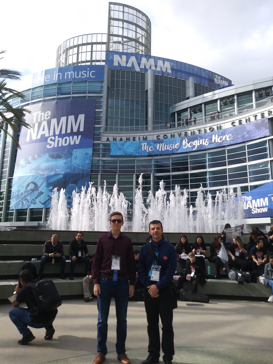 Chadron State College student Austen Pfeiffer and Dr. Mckay Tebbs pose at the National Association of Music Merchants
