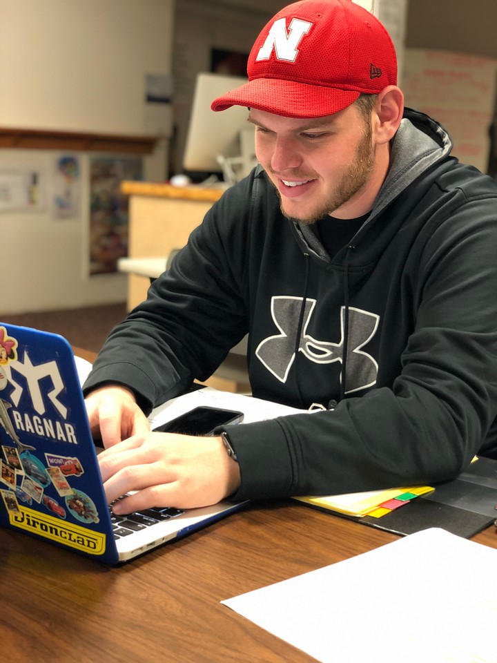 Chadron State College student Brendan Fangmeier poses for a photo while studying.