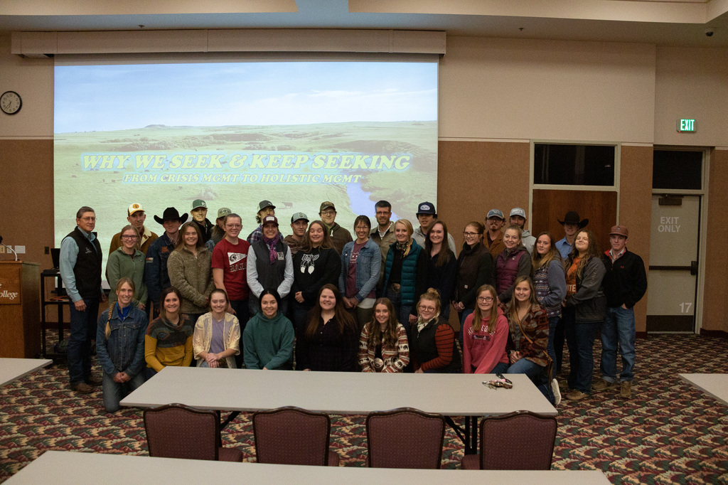 Tara and Josh Dukart of Seek First Ranch near Hazen, N.D., center, pose with Chadron State College range management students