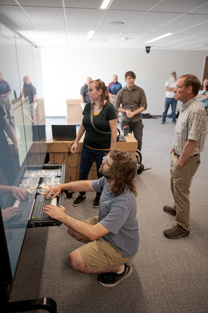 Three CSC faculty members use new technology put into the new math and science building.