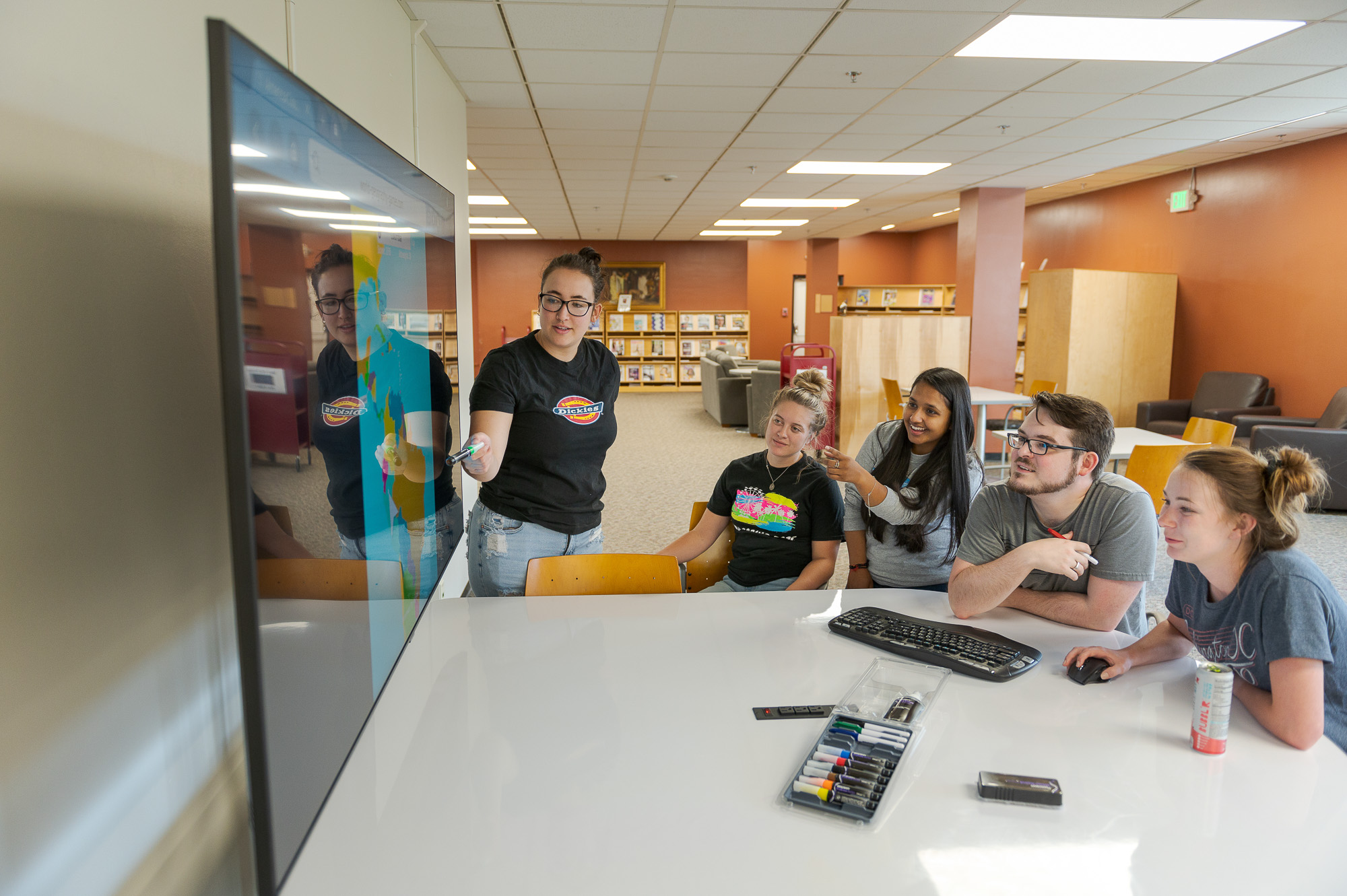 Students use an interactive workstation in the King Library
