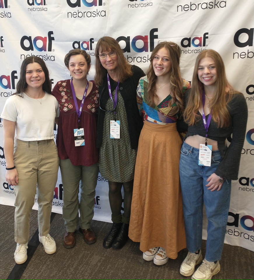 Five women standing
