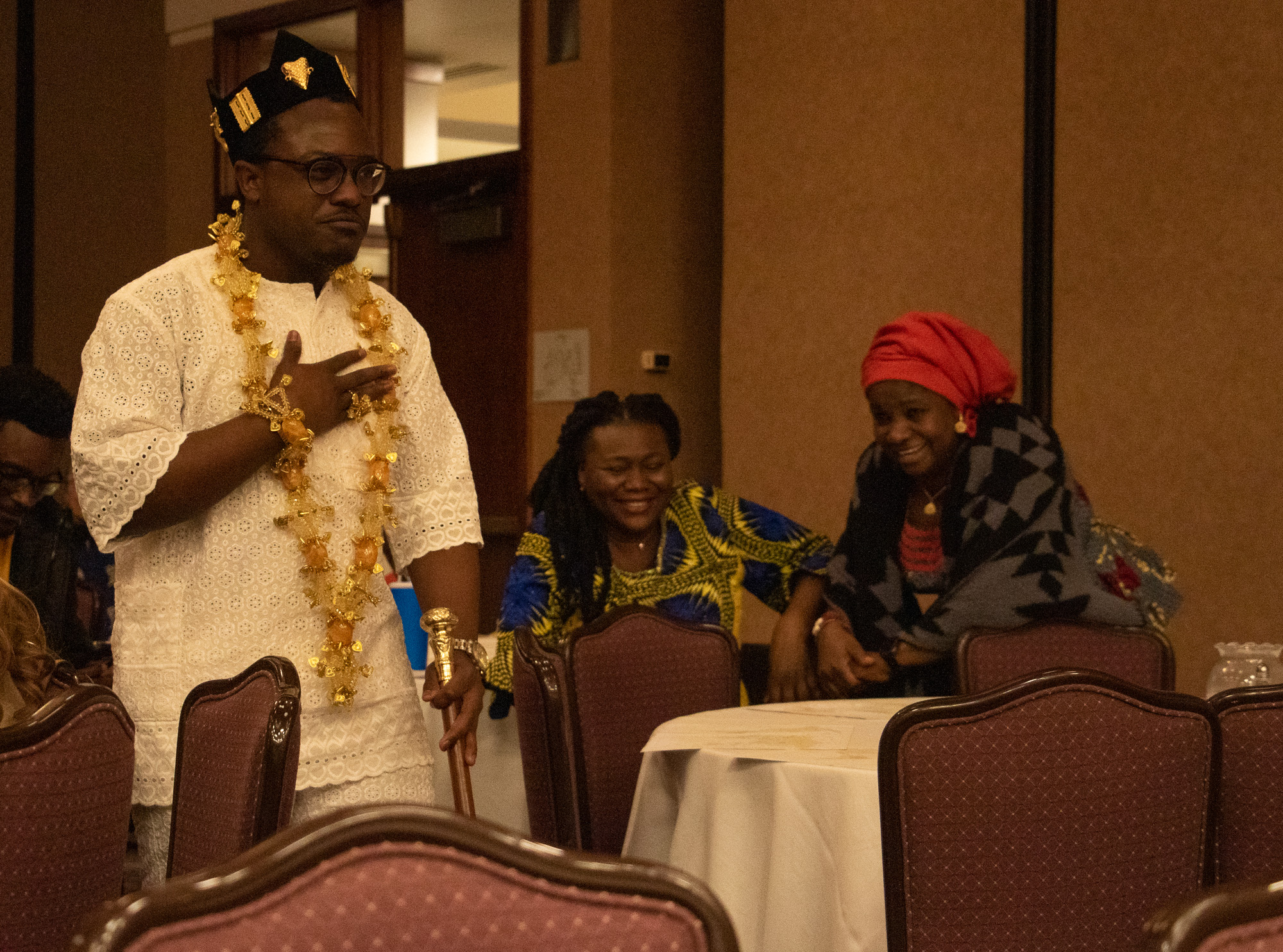 Man in traditional clothing performing an International Dinner