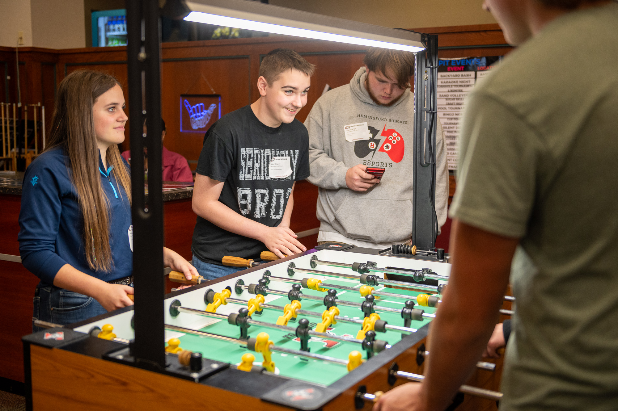 Scholastic Contest partipants play a game of foosball in The Pit during the 61st annual Scholastic Contest, Oct. 9, 2024.