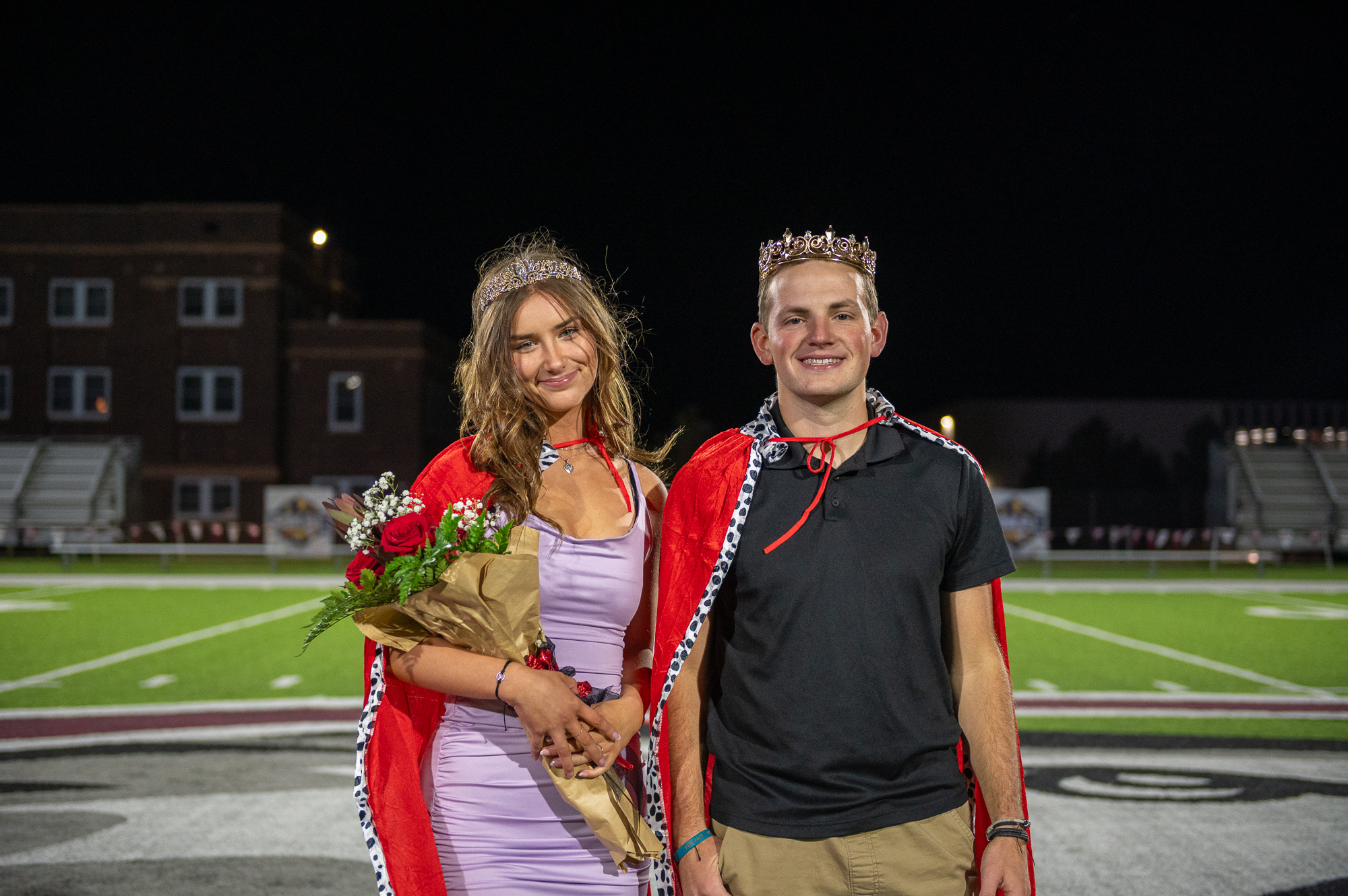 2024 Homecoming Queen nominated by the Residence Life Association, RLA, Samantha Brunner of Cheyenne, Wyo. and 2024 Homecoming King nominated by the Newman House, Caden Keller of Scottsbluff, Neb., pose for a photo after Coronation at the 2024 CSC Homecoming Pep Rally, Oct. 17, 2024. (Photo by Sydney Brown/Chadron State College).