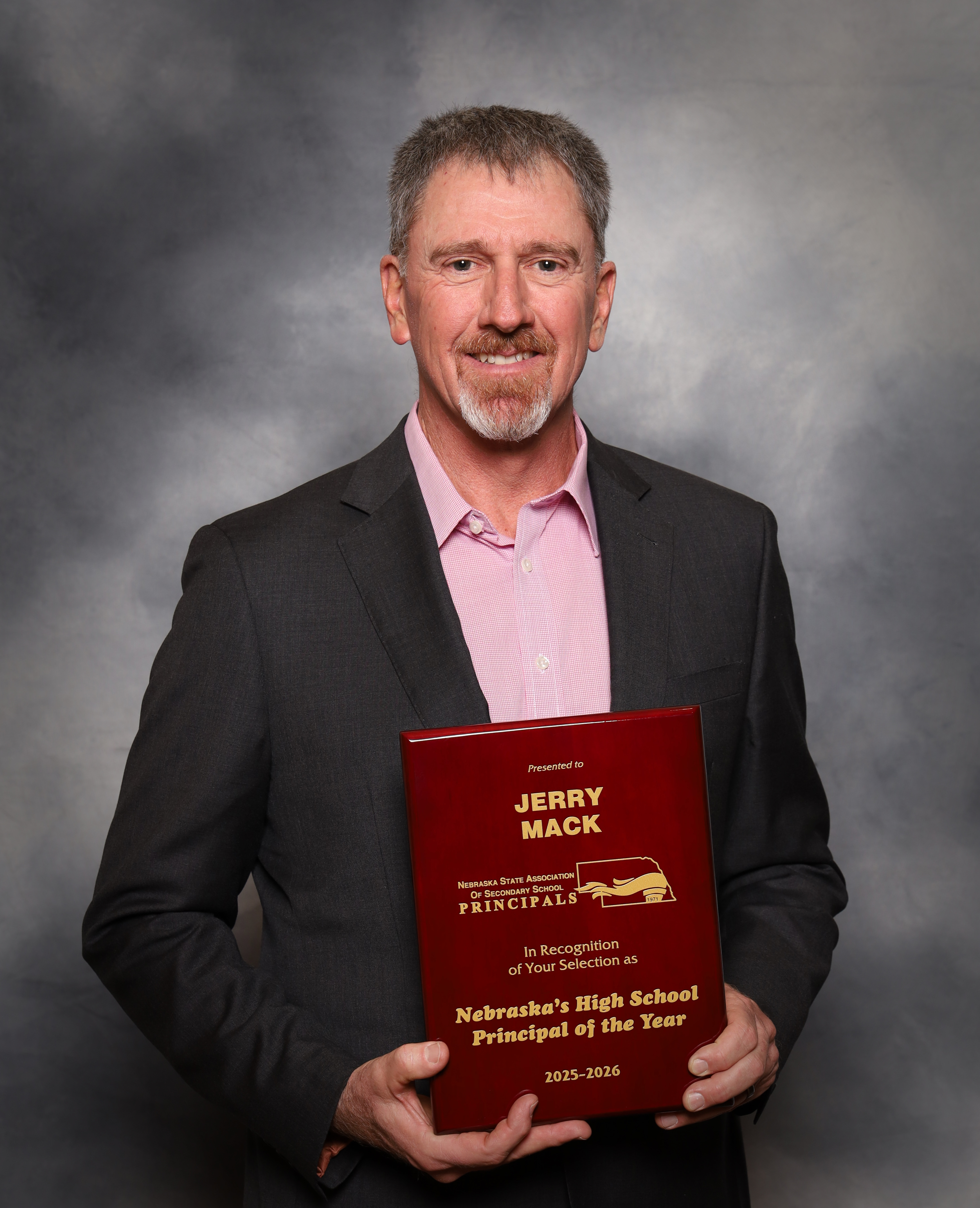 Jerry Mack with award