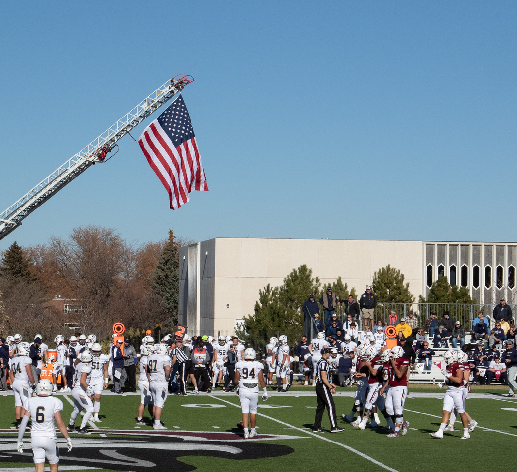 Flag flying over football field