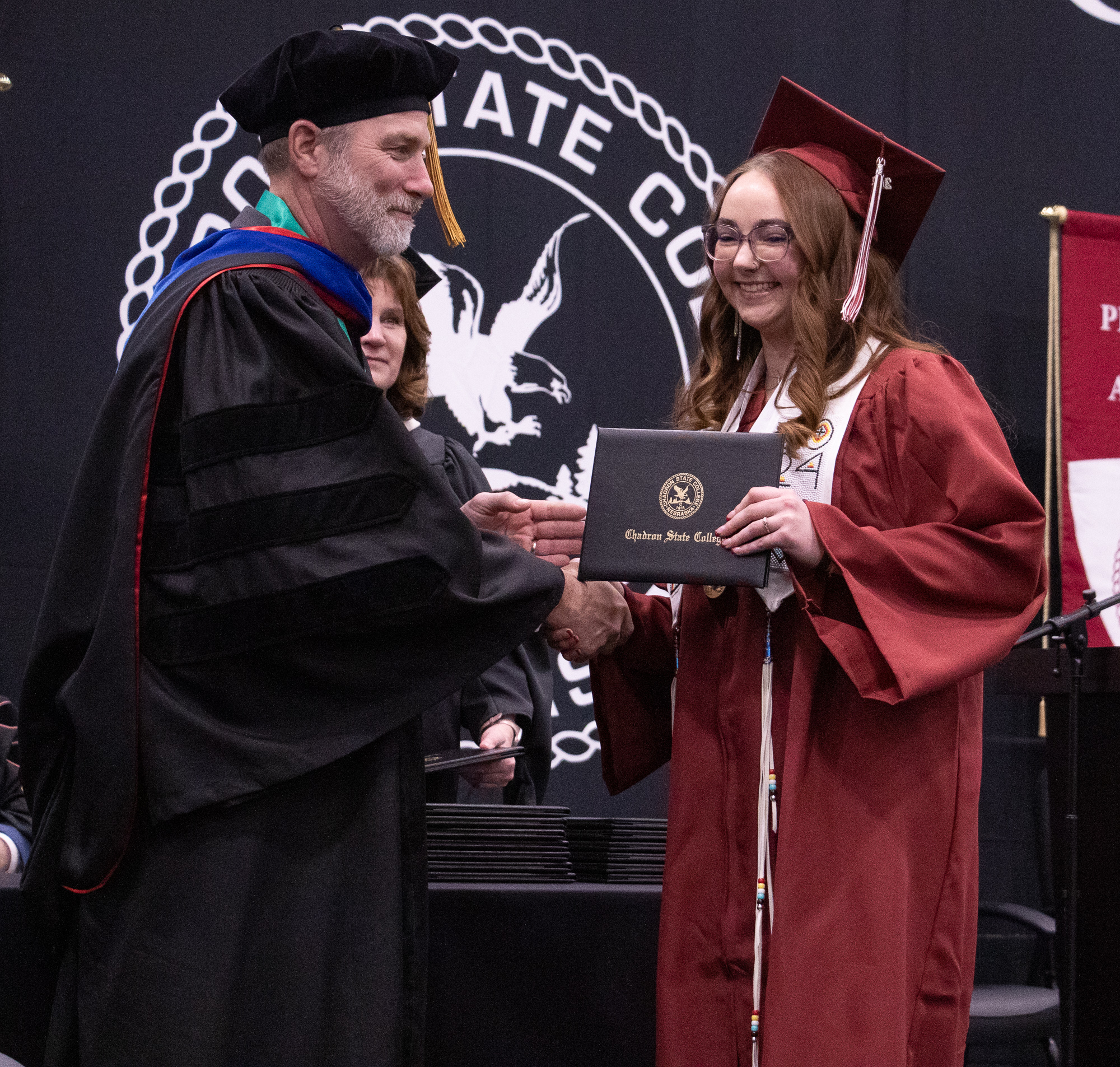 Student receiving her diploma