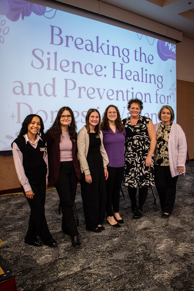 Students posing with a faculty member