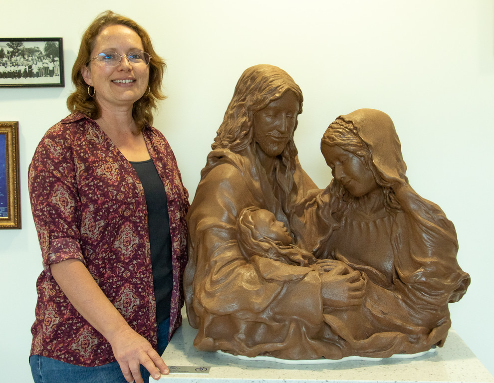 Woman with interior sculpture