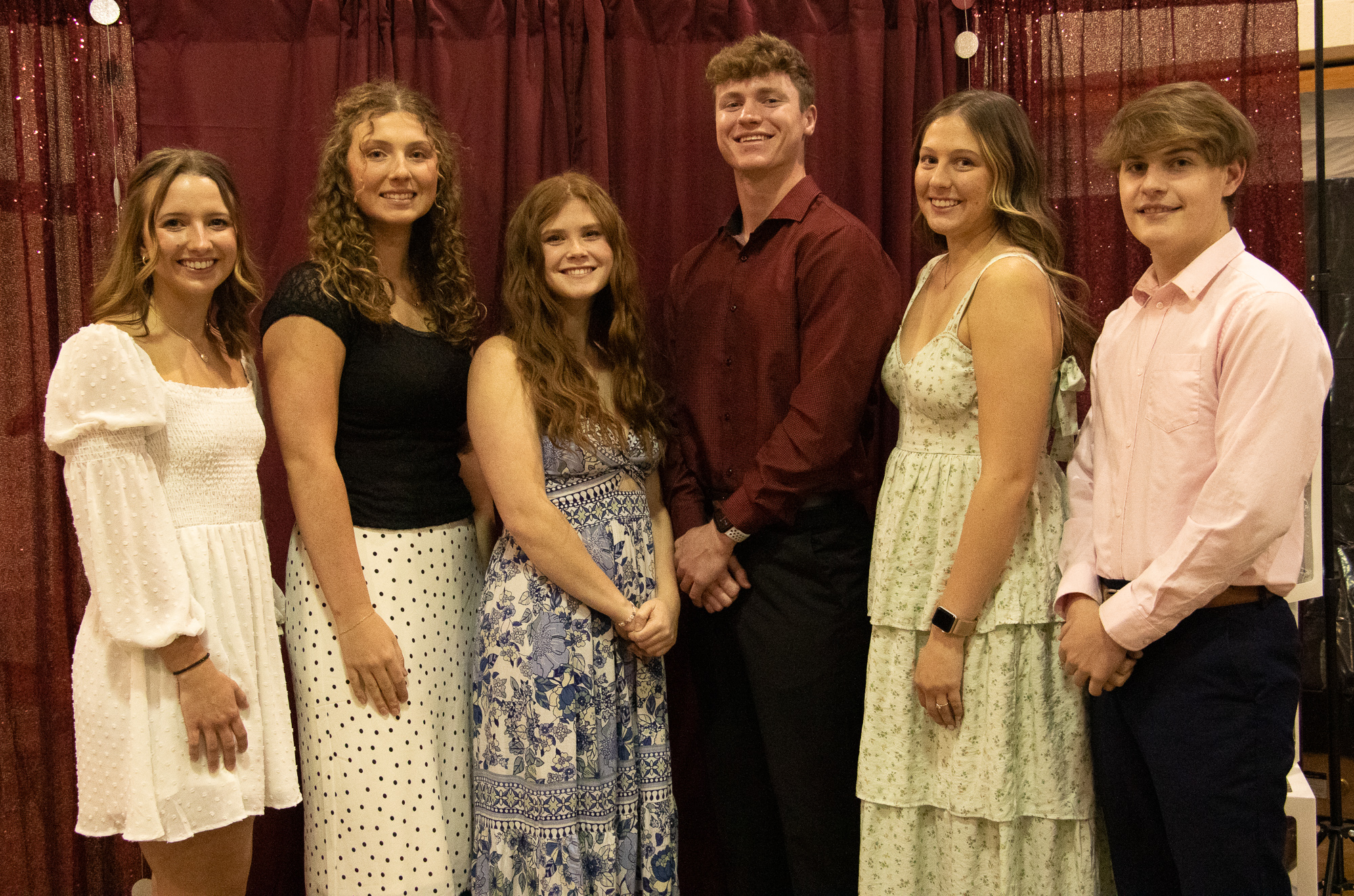 Group of students posing inside