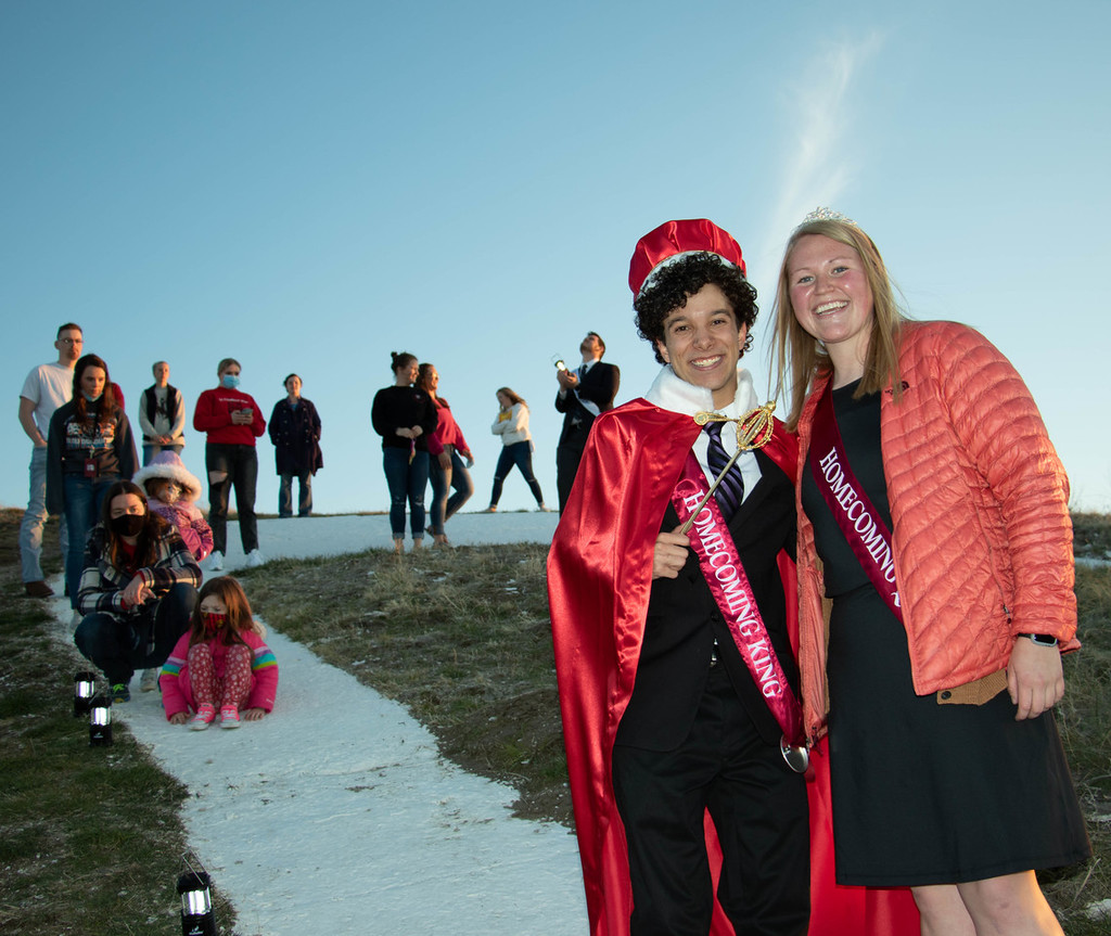 Homecoming royalty posing on c-hill