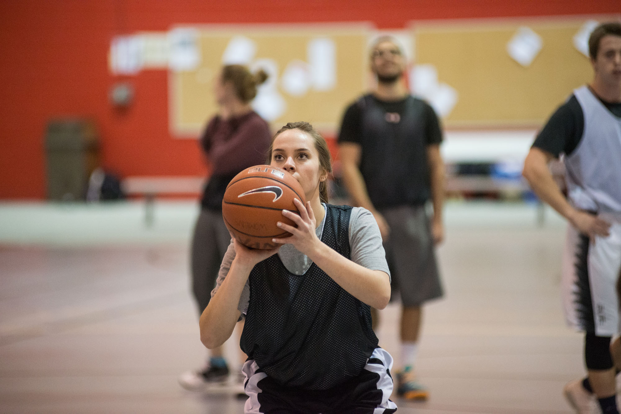 Photo of students playing intramural basketball