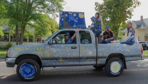 Truck painted in the style of Vincent van Gogh for a Homecoming parade